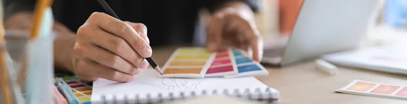 Person inspecting color swatches