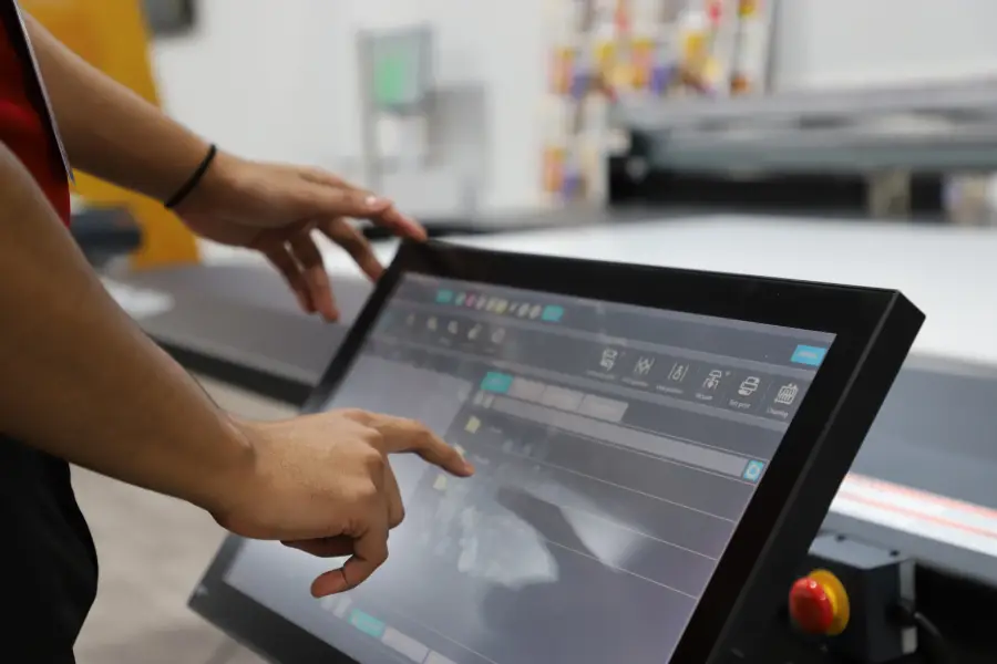 Person operating printer controls